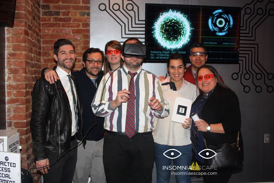 family visiting insomnia escape room dc